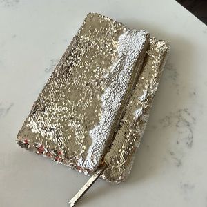 Stella and Dot clutch! Gold changing sequins.